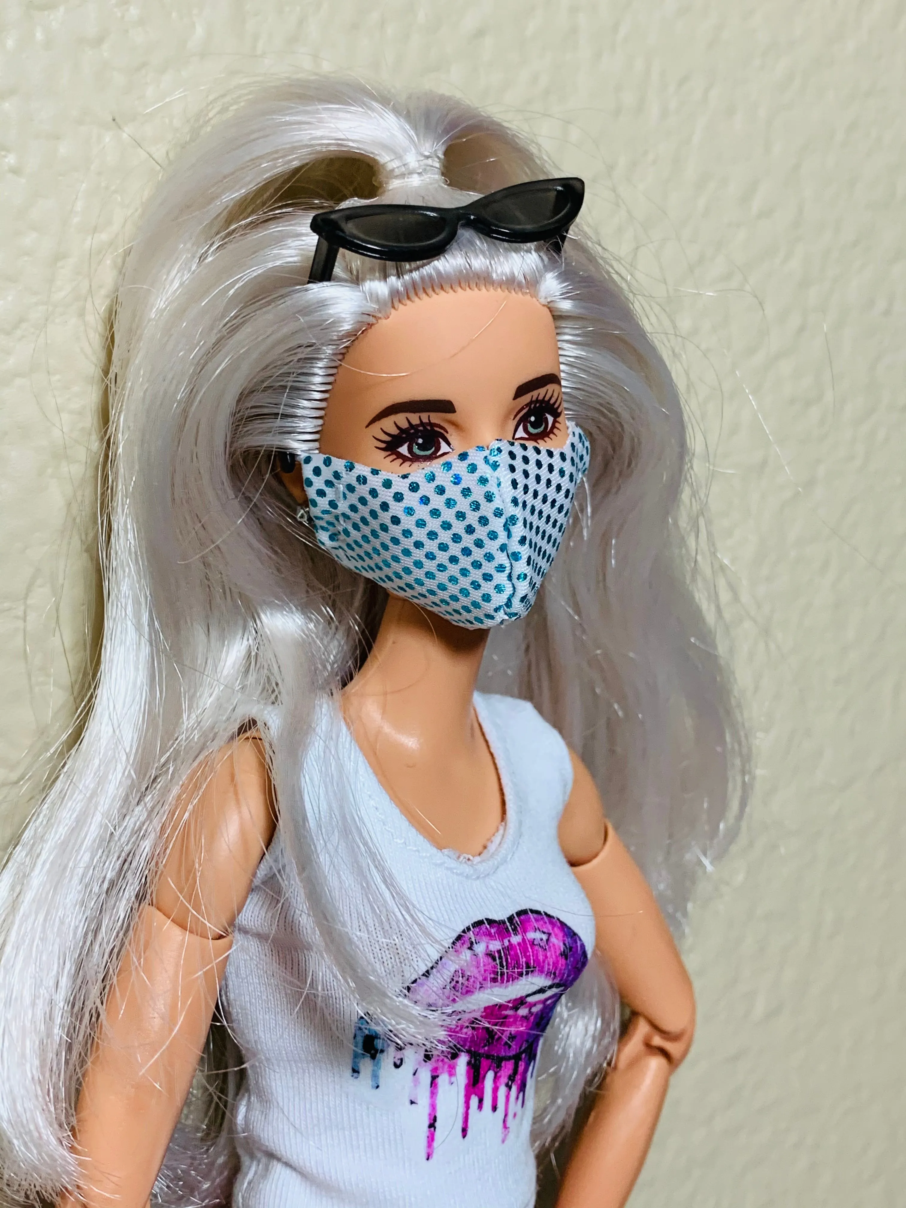 Blue and white Barbie doll face mask