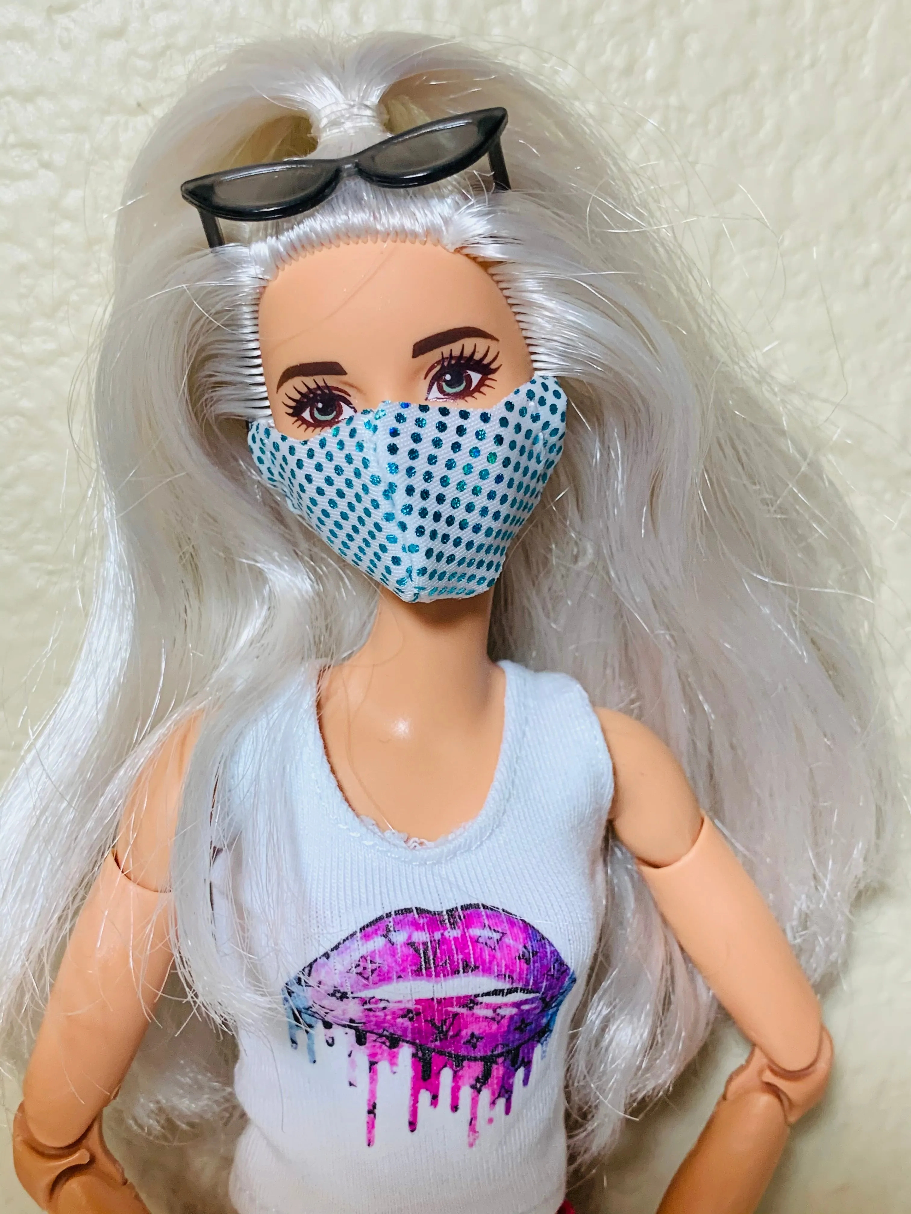 Blue and white Barbie doll face mask