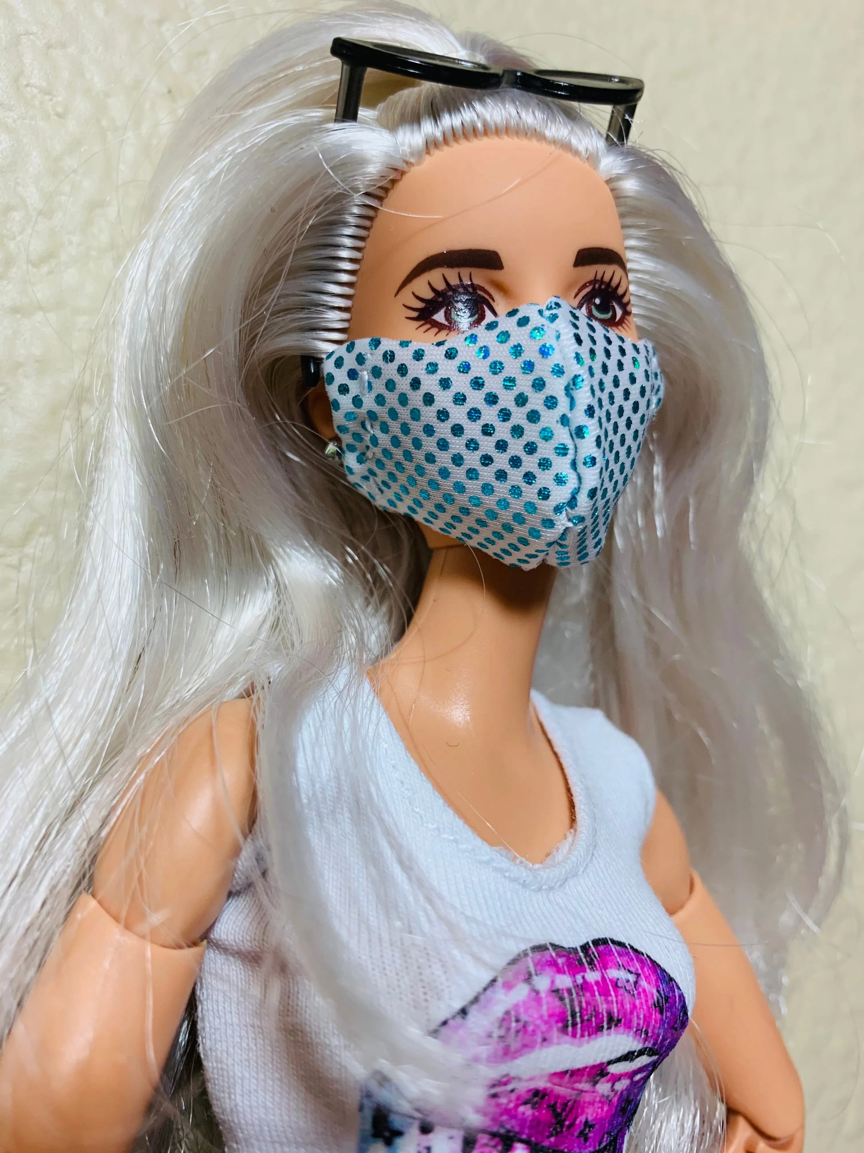 Blue and white Barbie doll face mask